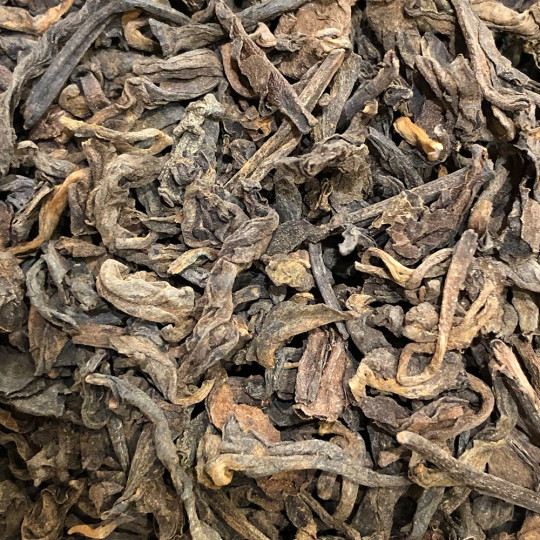 Assemblage du thé Pu-Erh Vintage Yunnan, un thé au goût intense